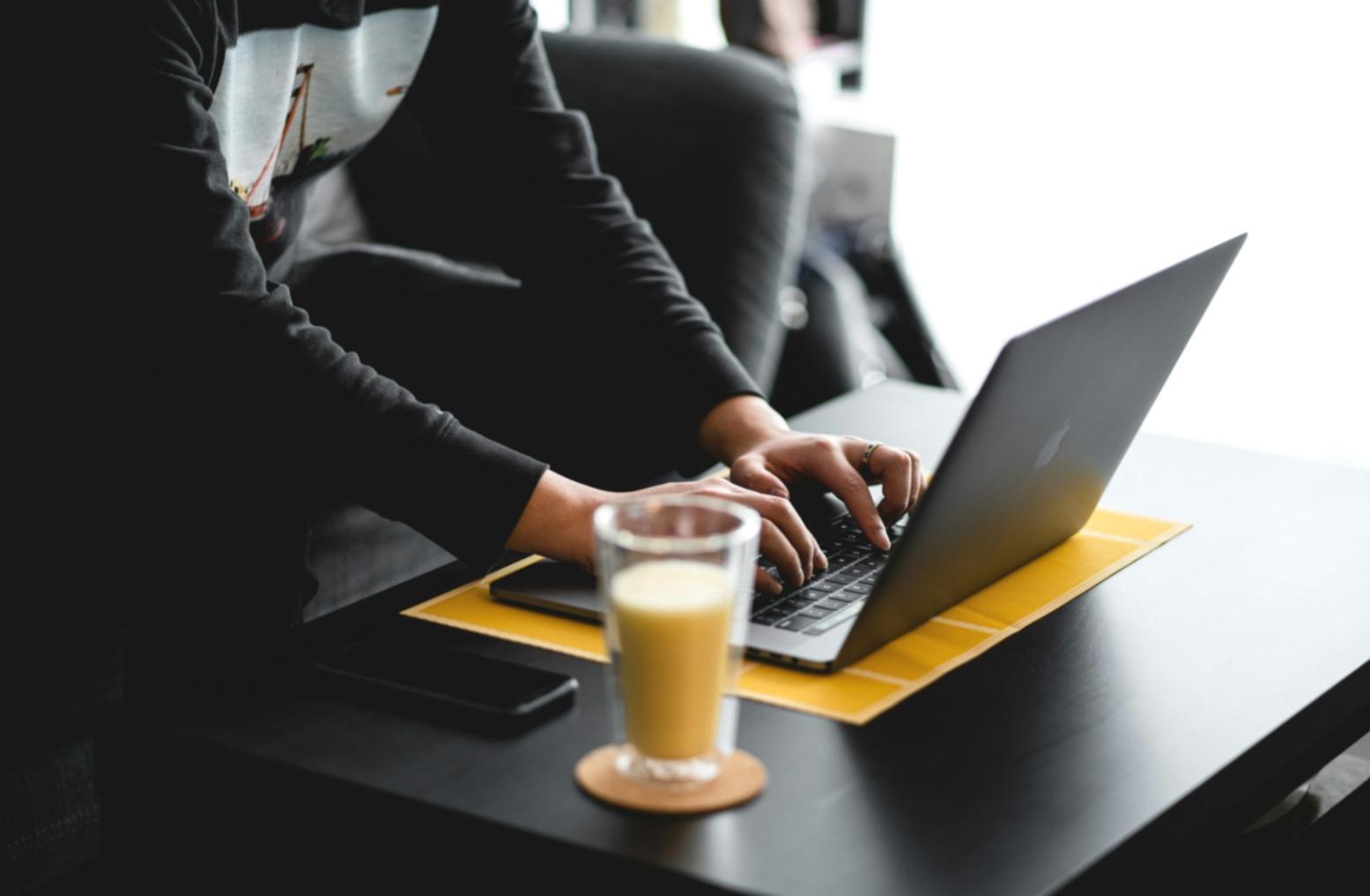 Financial professional reviewing statement analysis with detailed notes and highlighted sections